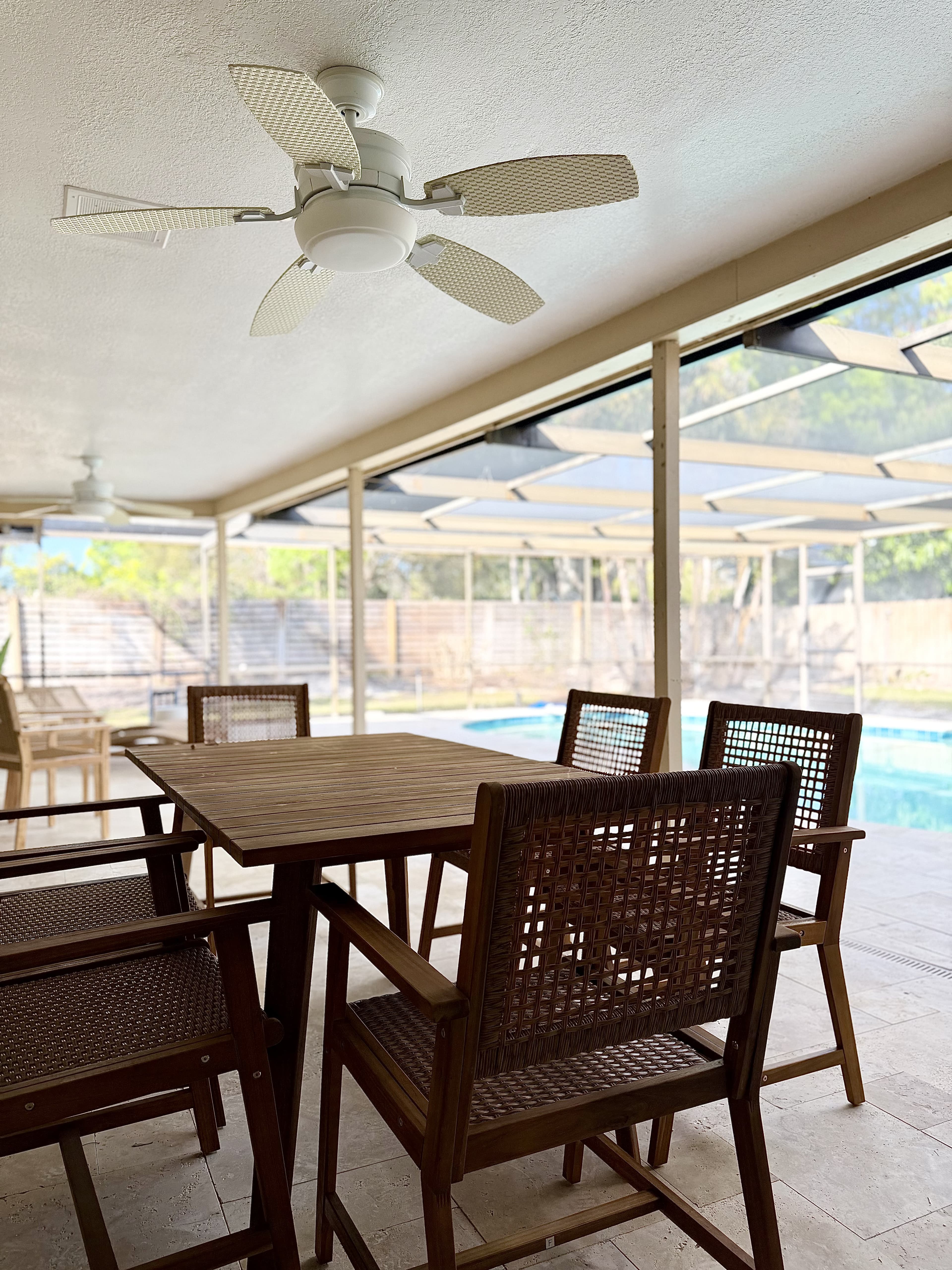 Covered lanai with pool view